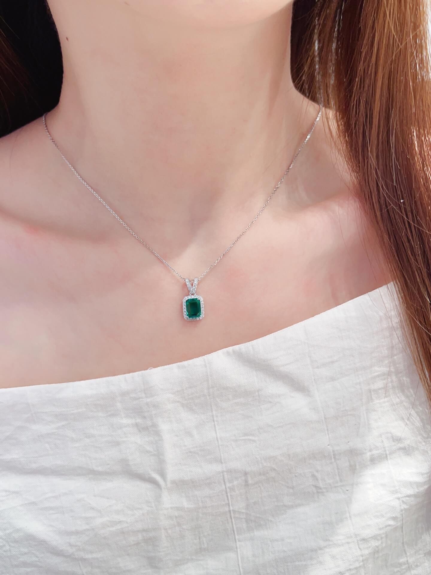 Halo setting emerald cut lab grown emerald pendant necklace