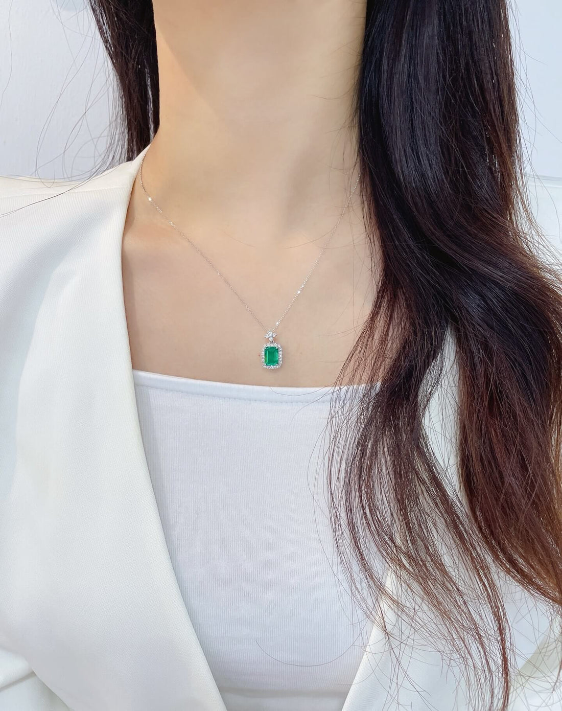 Halo setting emerald cut lab grown emerald pendant necklace