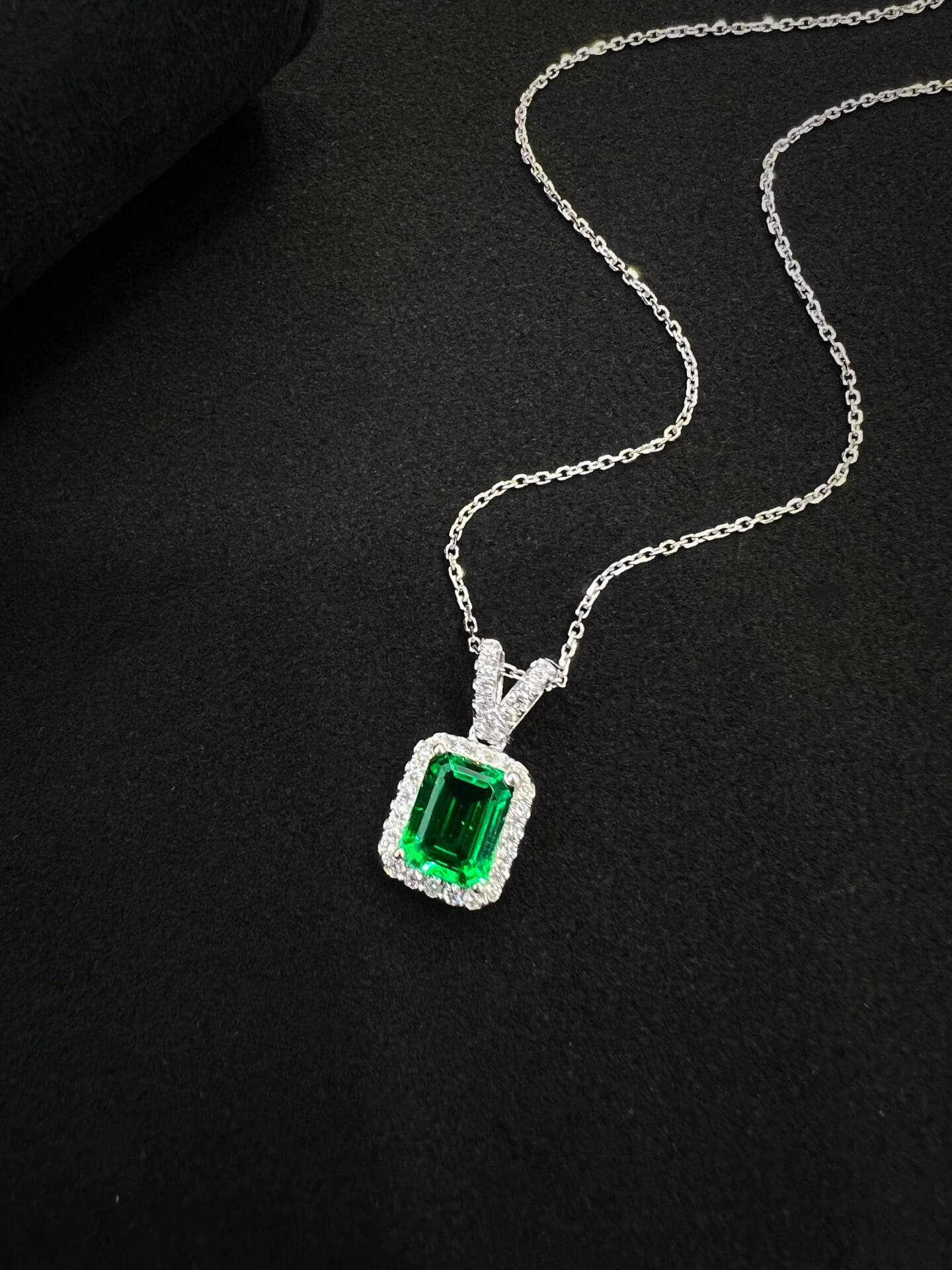 Halo setting emerald cut lab grown emerald pendant necklace