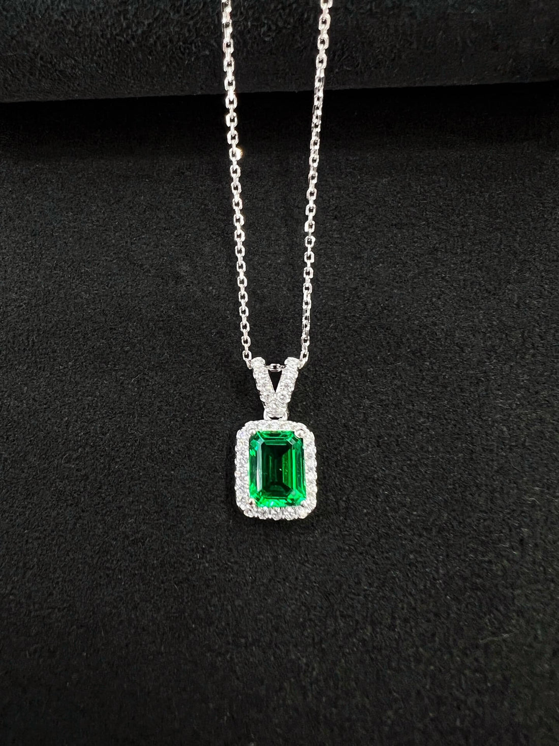 Halo setting emerald cut lab grown emerald pendant necklace