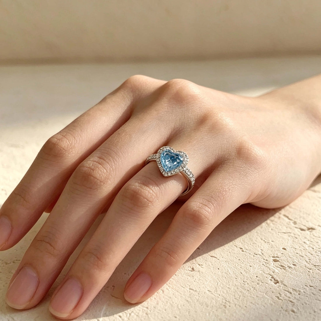 Halo setting heart cut lab grown blue diamond engagement ring