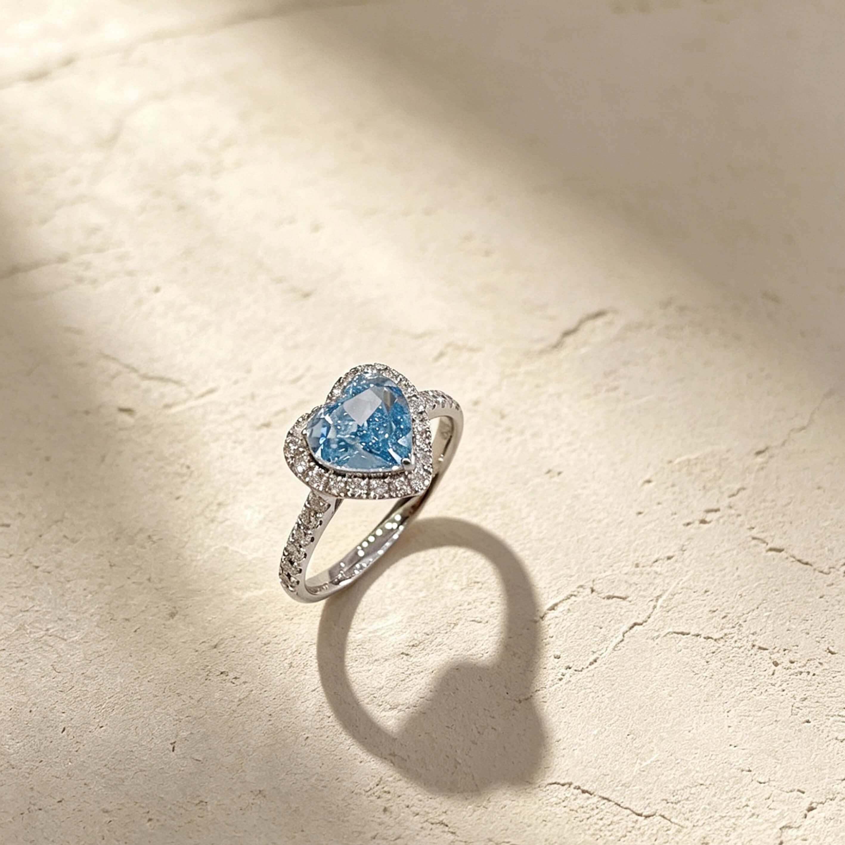 Halo setting heart cut lab grown blue diamond engagement ring