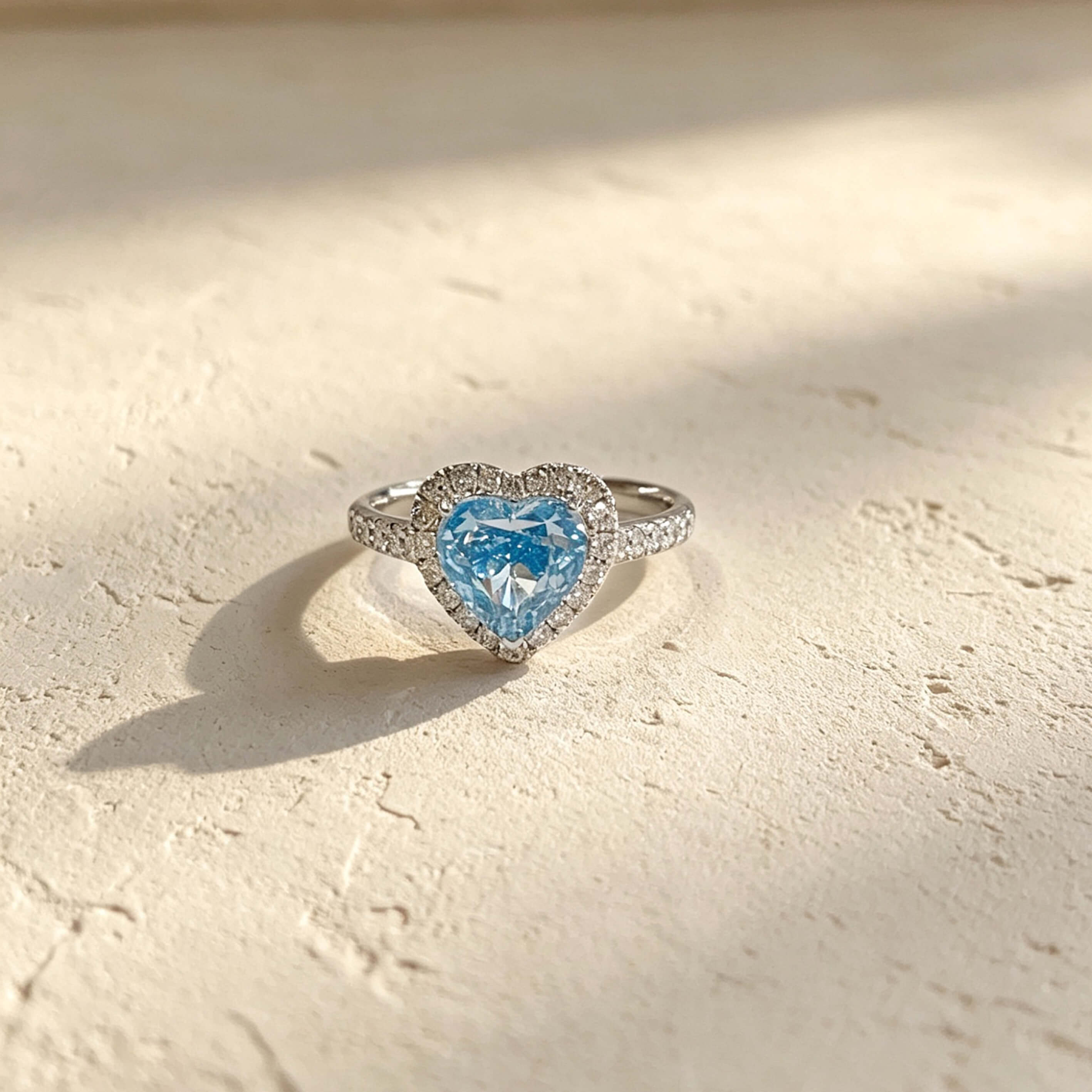 Halo setting heart cut lab grown blue diamond engagement ring
