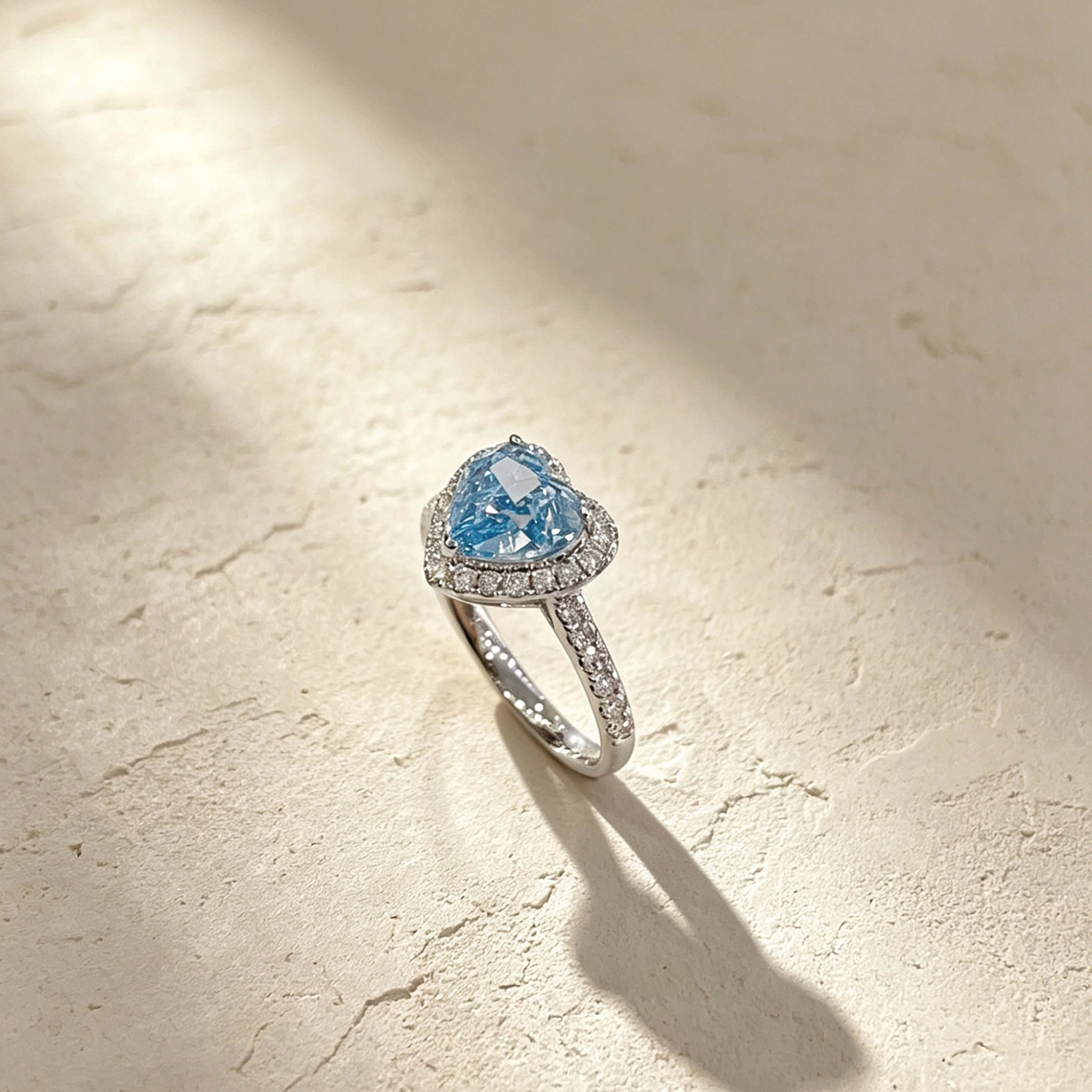 Halo setting heart cut lab grown blue diamond engagement ring