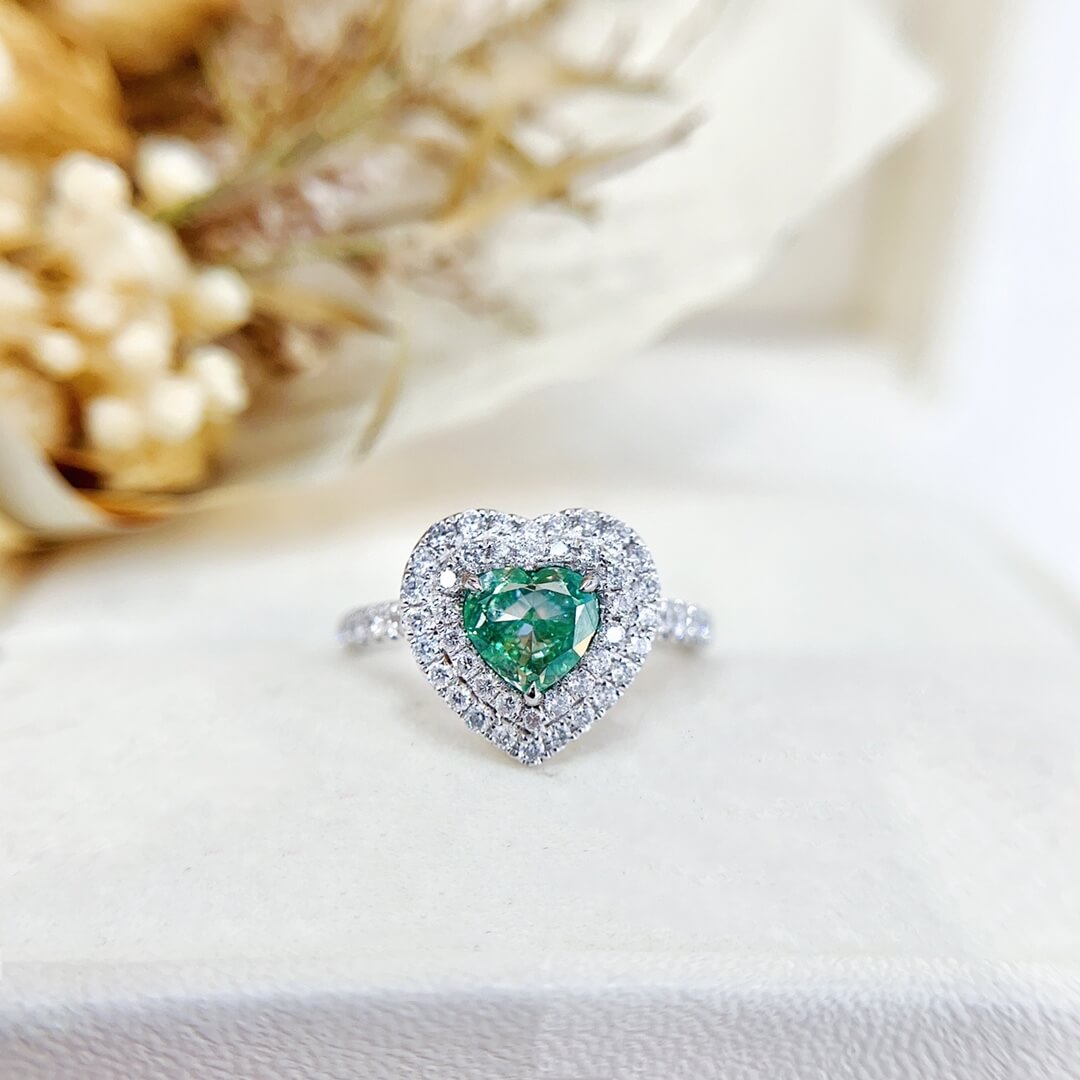 Halo setting heart cut lab grown green diamond engagement ring