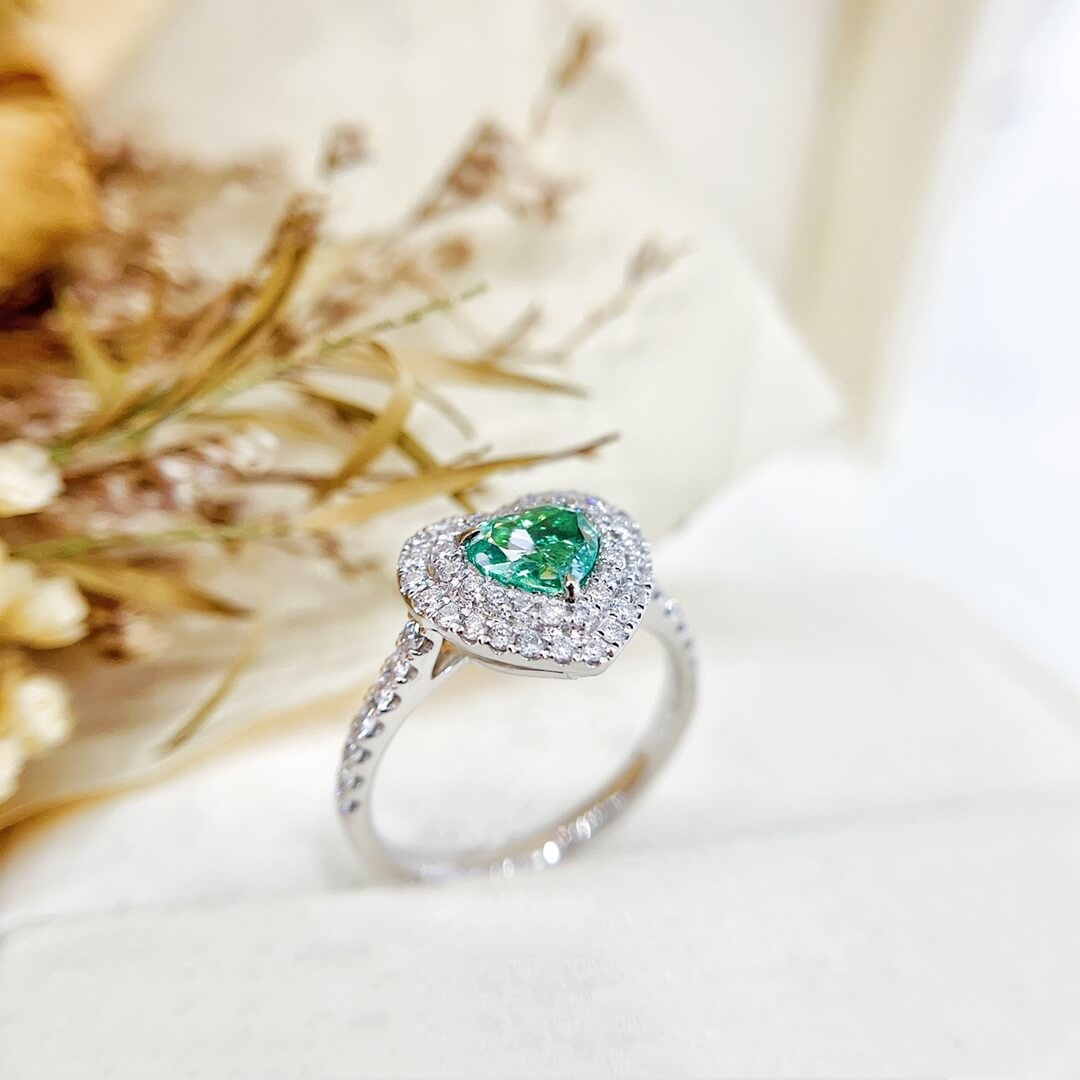 Halo setting heart cut lab grown green diamond engagement ring