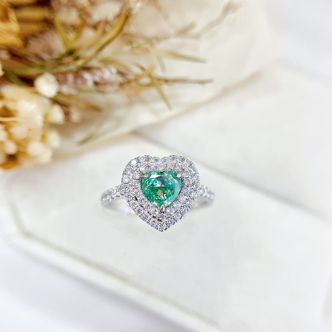 Halo setting heart cut lab grown green diamond engagement ring