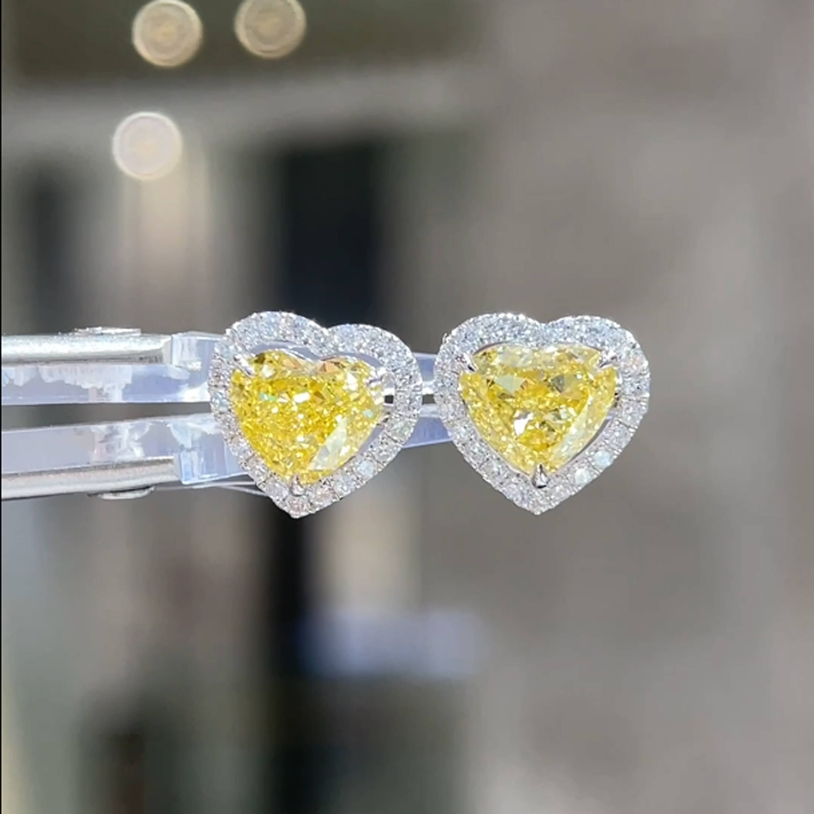Halo setting heart cut lab grown yellow diamond earrings stud
