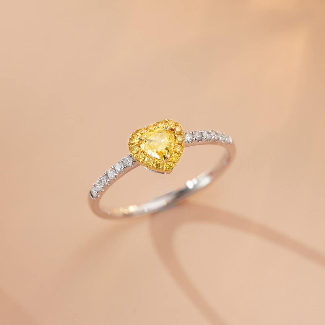 Halo setting heart cut lab grown yellow diamond engagement ring
