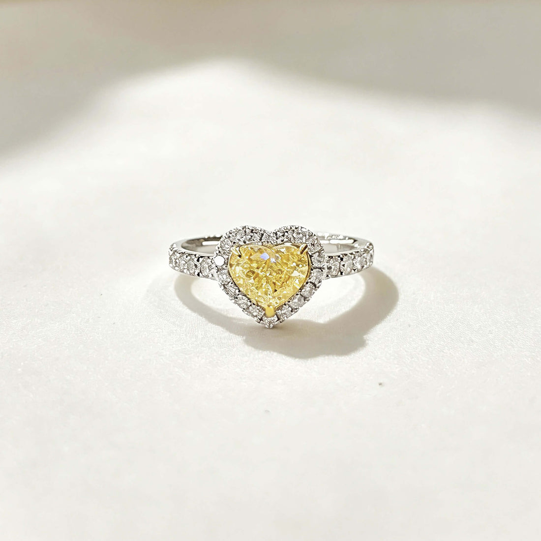 Halo setting heart cut lab grown yellow diamond engagement ring