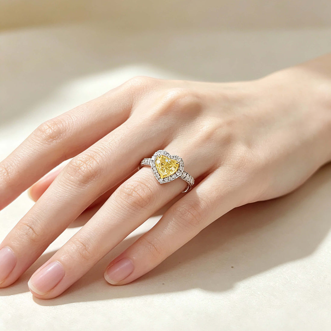 Halo setting heart cut lab grown yellow diamond engagement ring