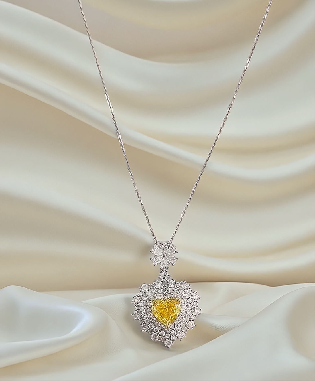 Halo setting heart cut lab grown yellow diamond necklace