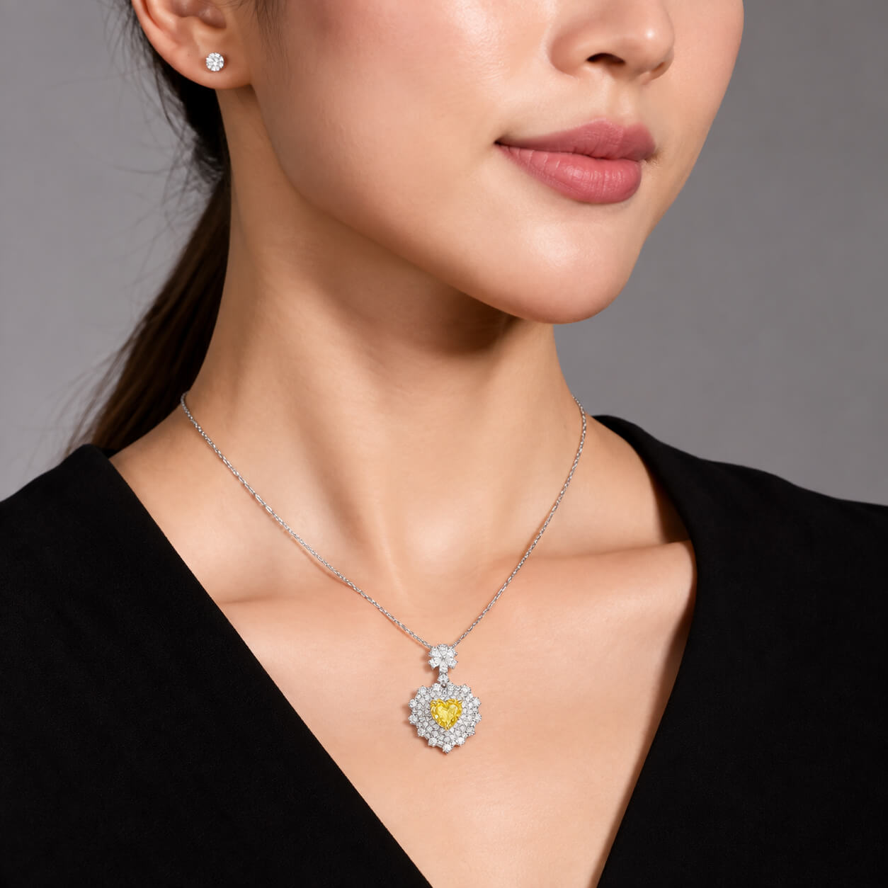 Halo setting heart cut lab grown yellow diamond necklace