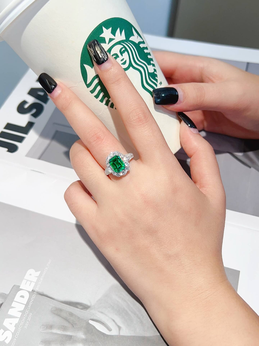 Halo setting lab grown emerald engagement ring