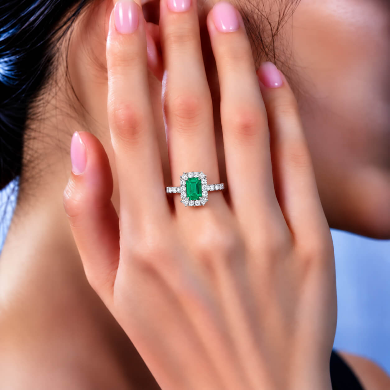 Halo setting lab grown emerald engagement ring