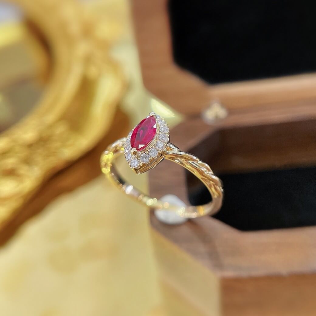 Halo setting marquise cut lab grown ruby engagement ring