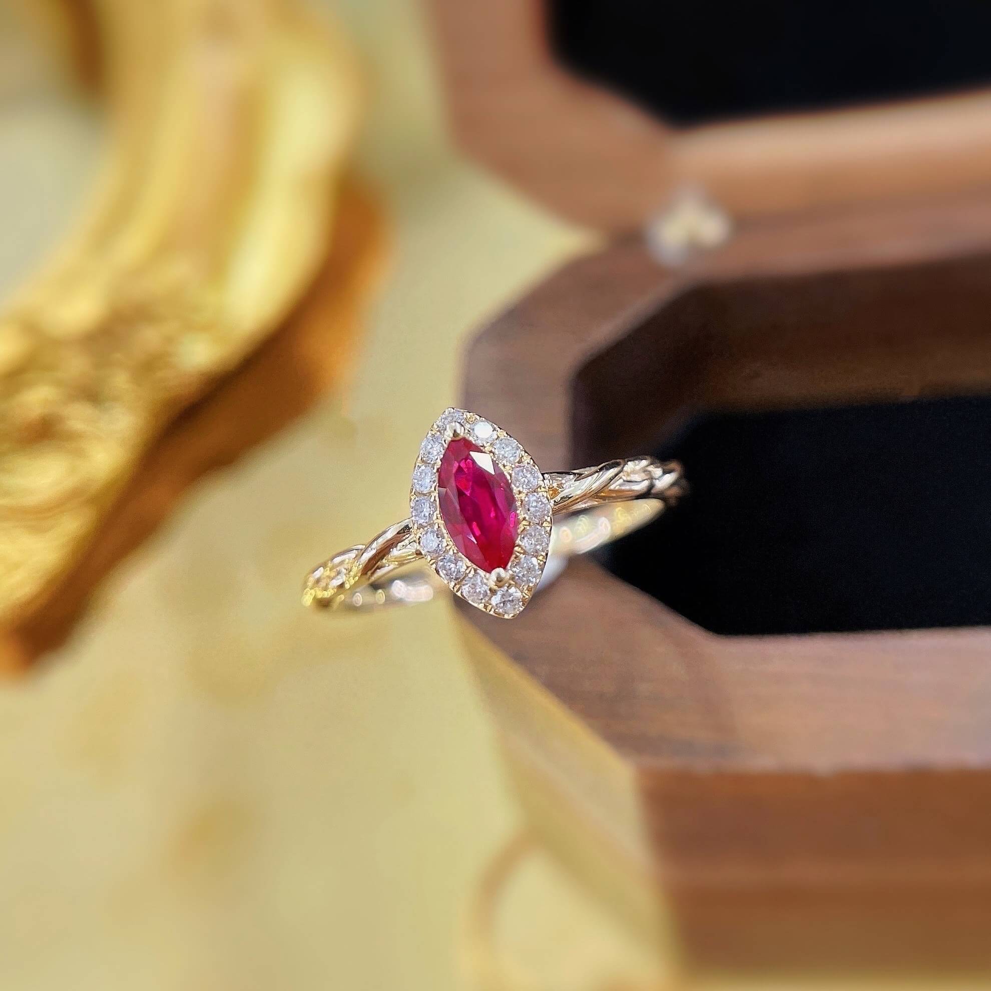 Halo setting marquise cut lab grown ruby engagement ring