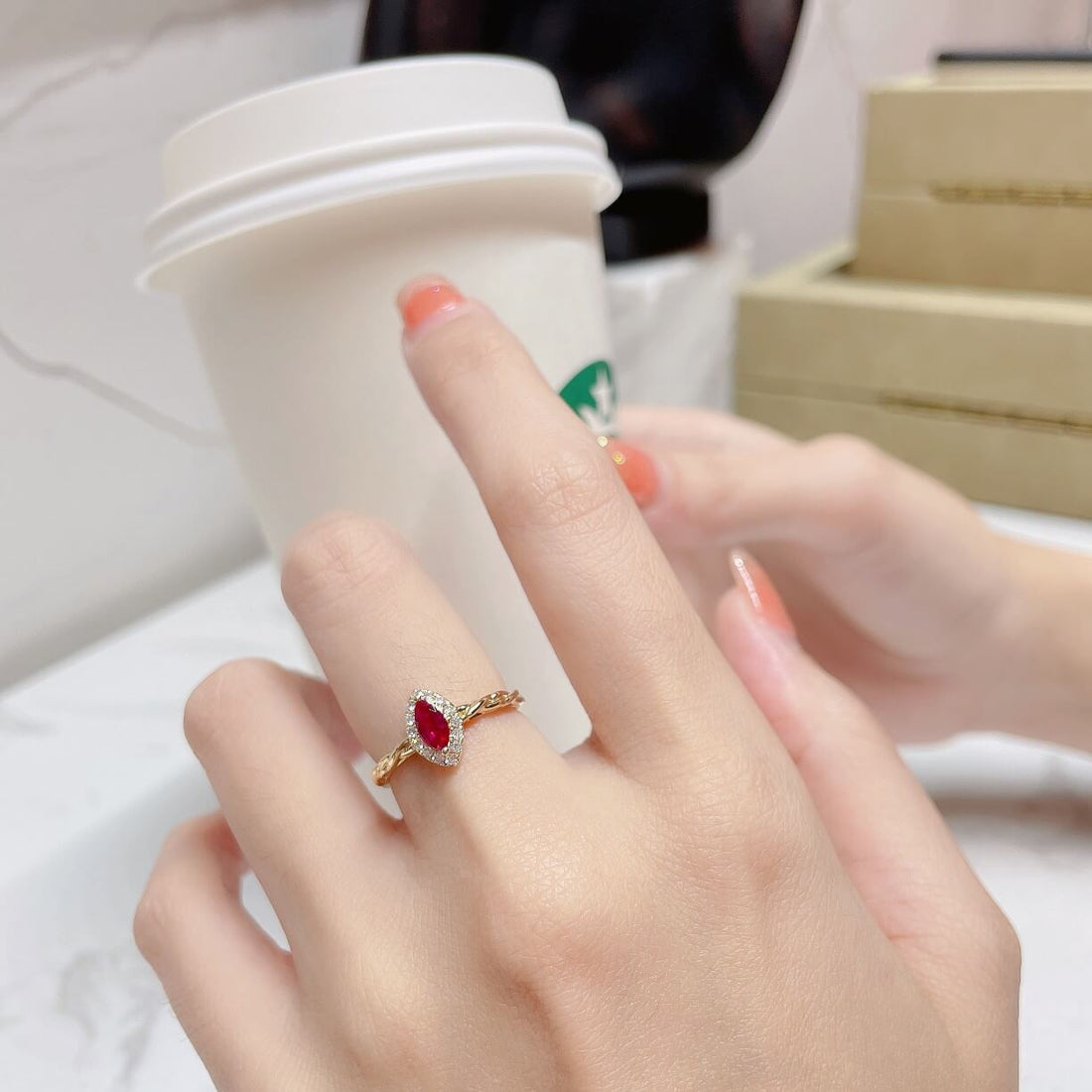 Halo setting marquise cut lab grown ruby engagement ring