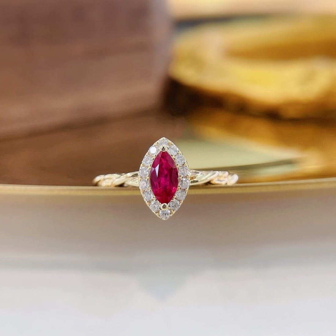 Halo setting marquise cut lab grown ruby engagement ring