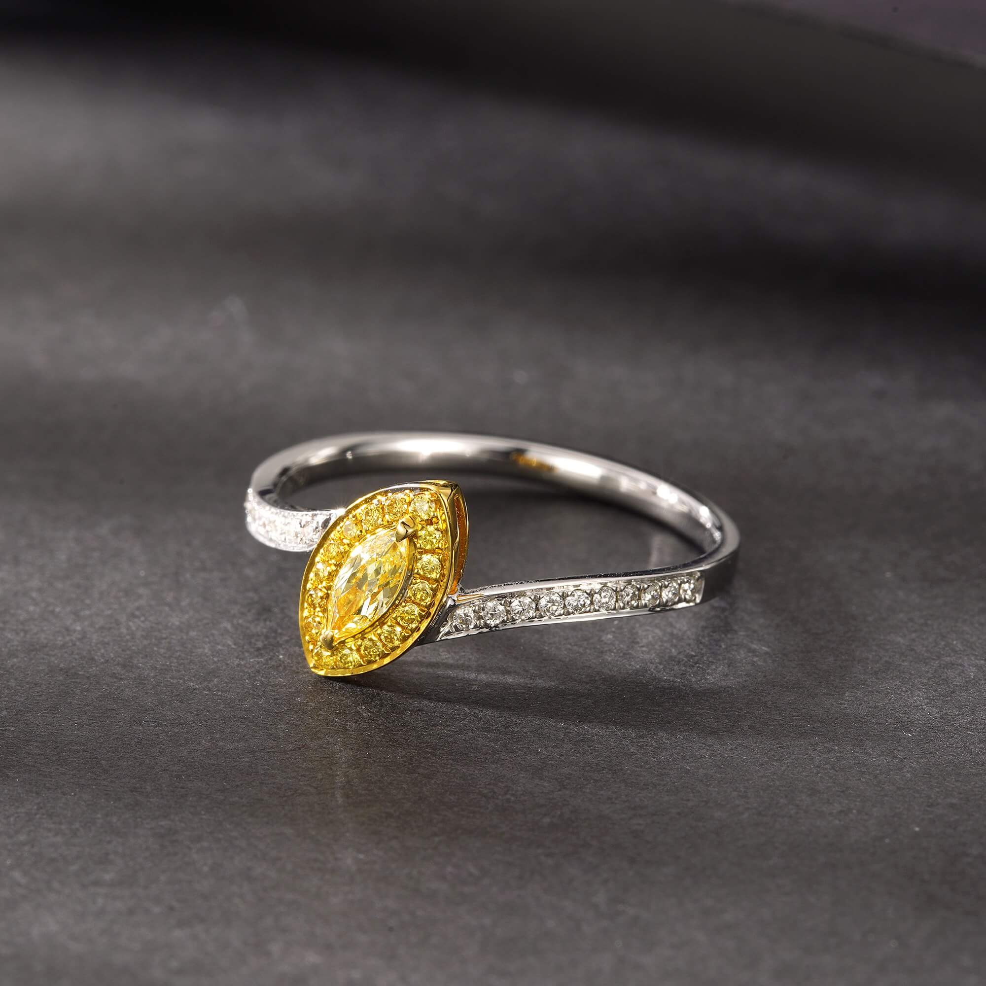 Halo setting marquise cut lab grown yellow diamond engagement ring