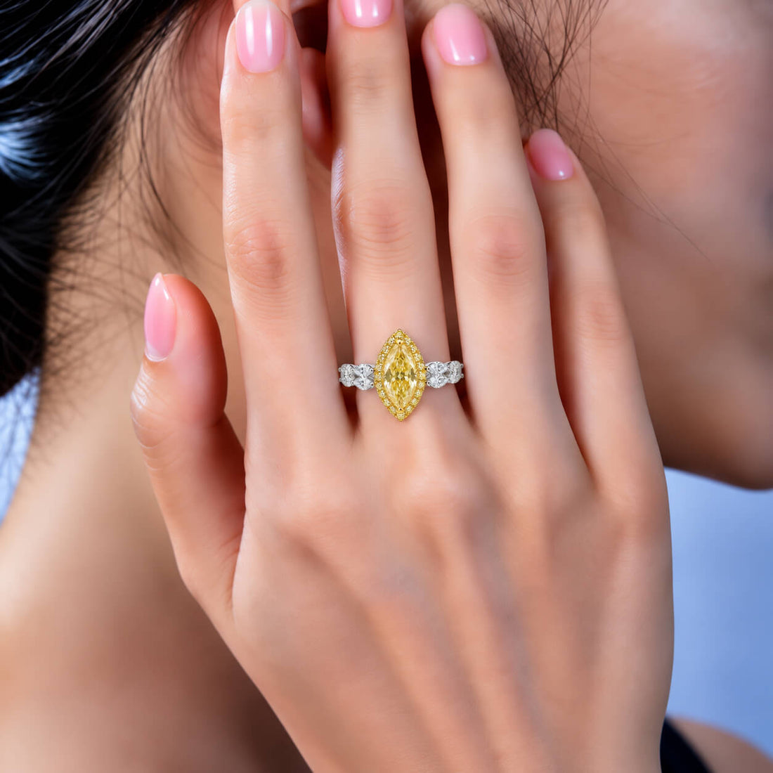 Halo setting marquise cut lab grown yellow diamond engagement ring