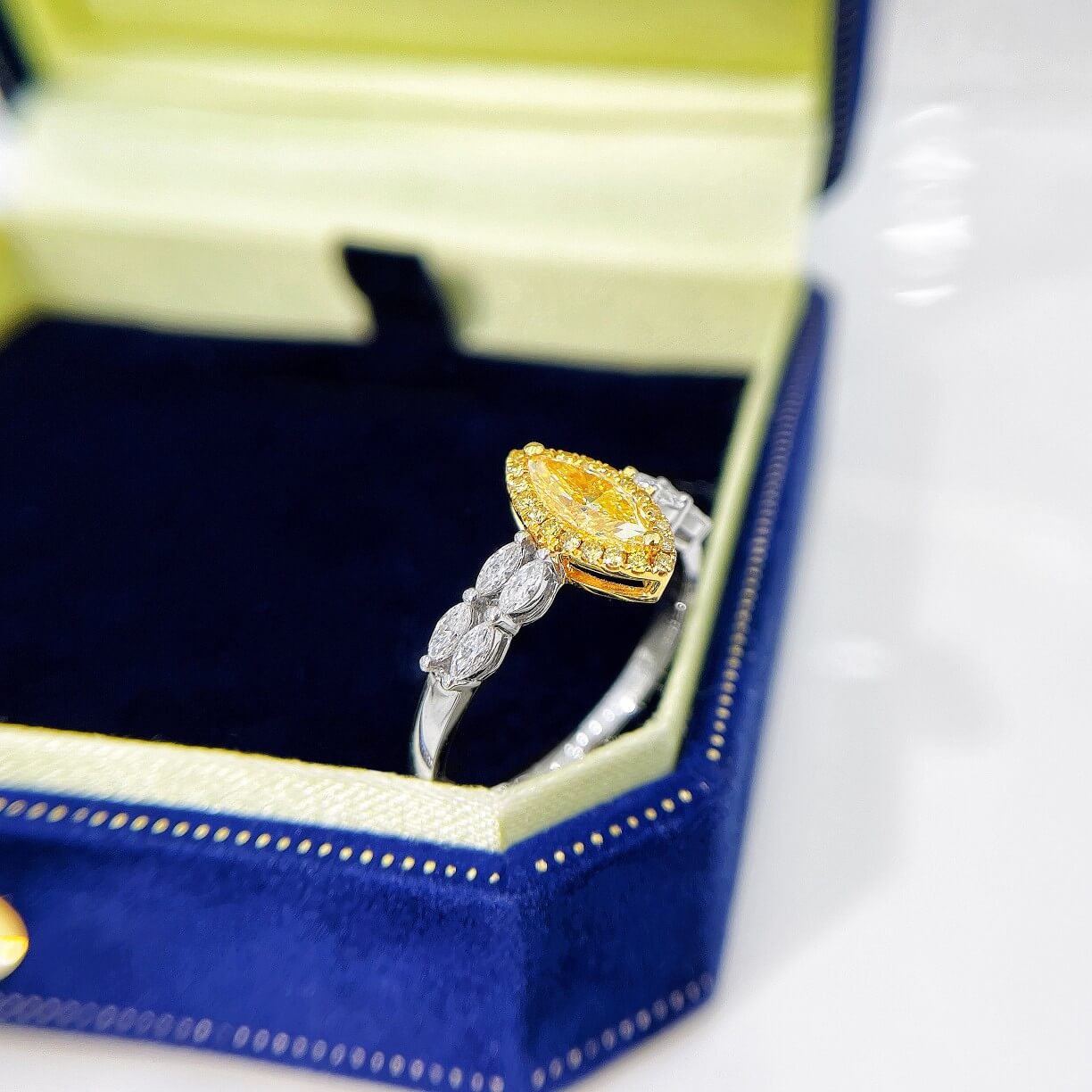 Halo setting marquise cut lab grown yellow diamond engagement ring