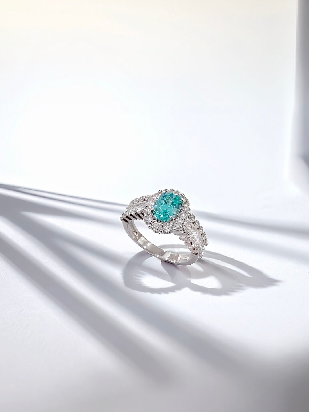 Halo setting oval cut  lab grown Paraiba engagement ring