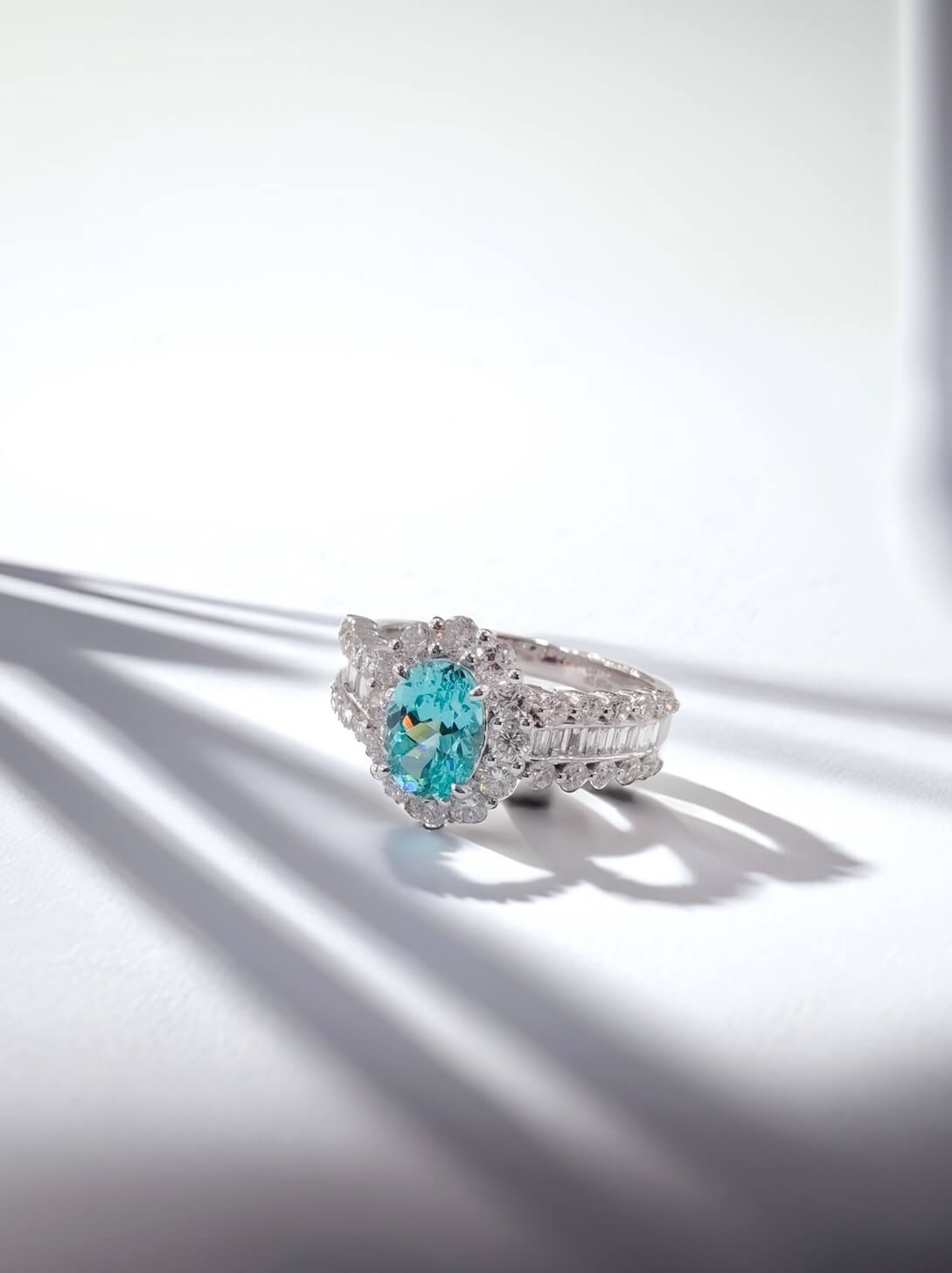 Halo setting oval cut  lab grown Paraiba engagement ring