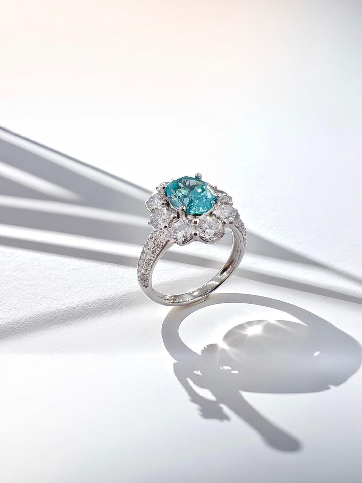 Halo setting oval cut  lab grown Paraiba engagement ring