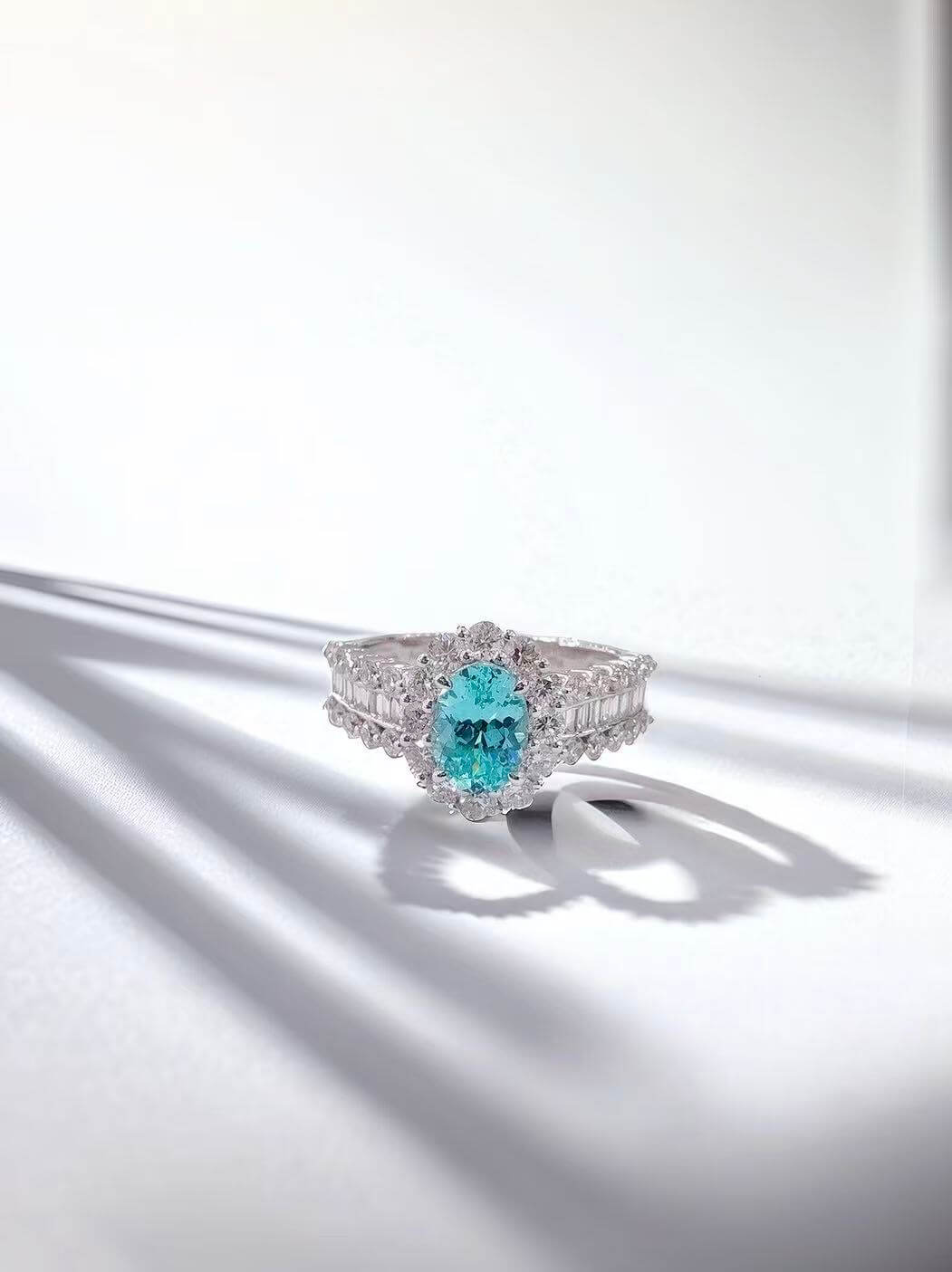 Halo setting oval cut  lab grown Paraiba engagement ring