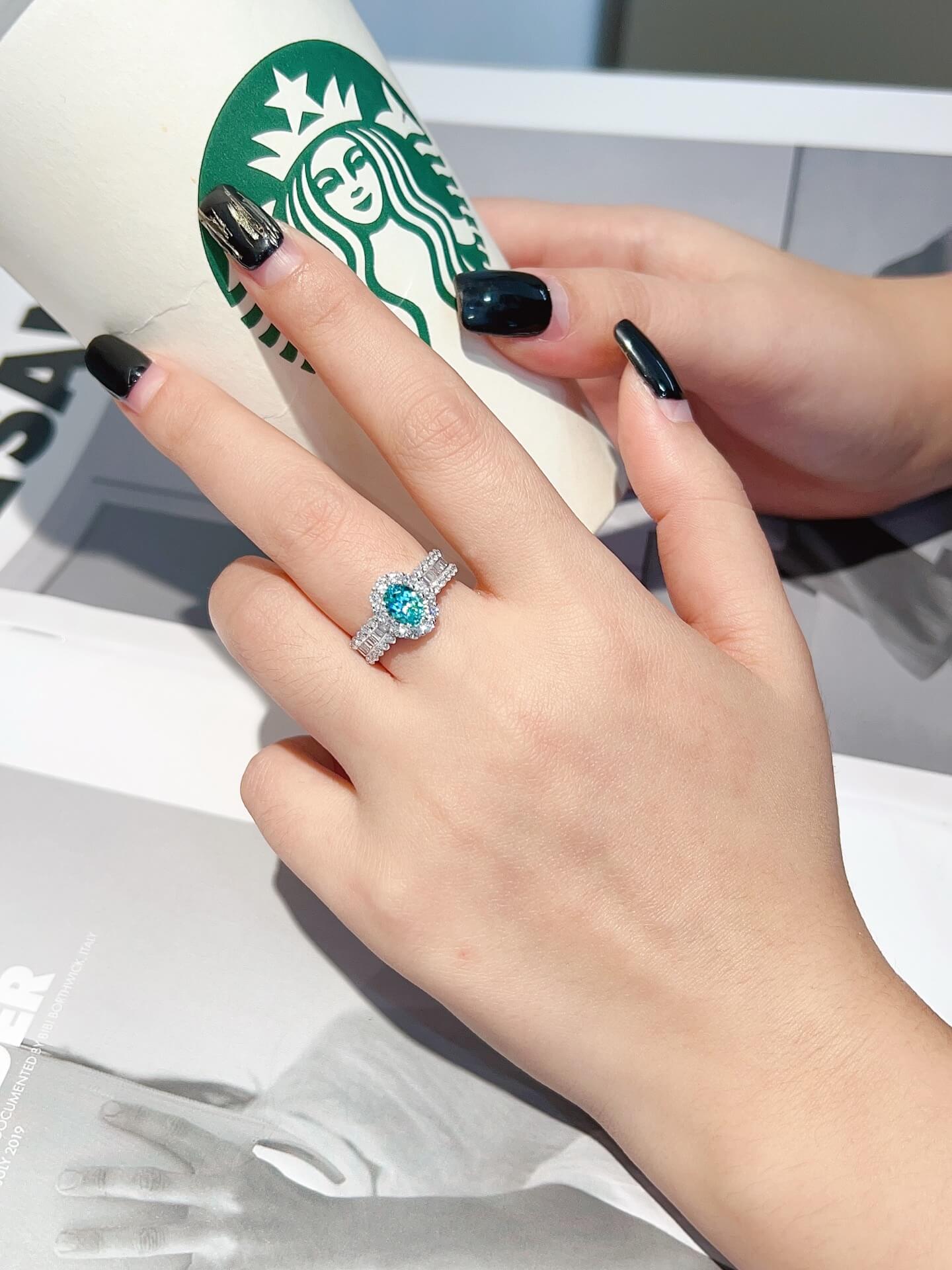 Halo setting oval cut  lab grown Paraiba engagement ring