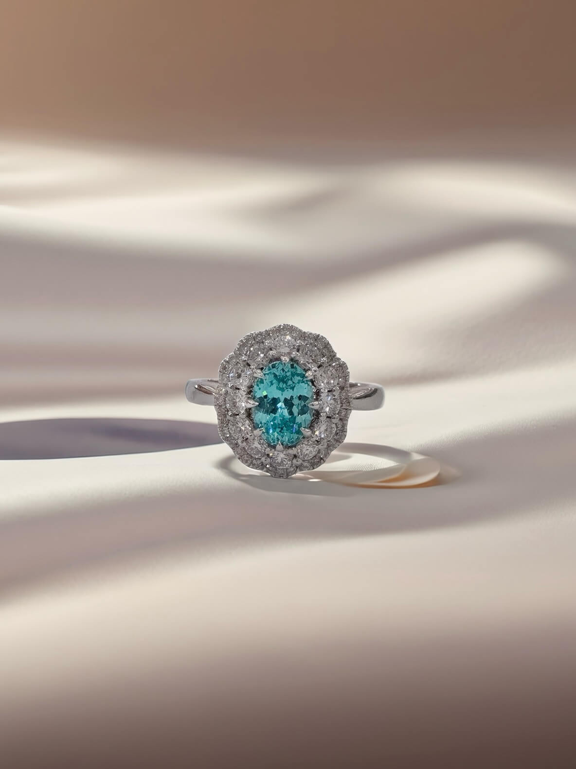 Halo setting oval cut  lab grown Paraiba engagement ring