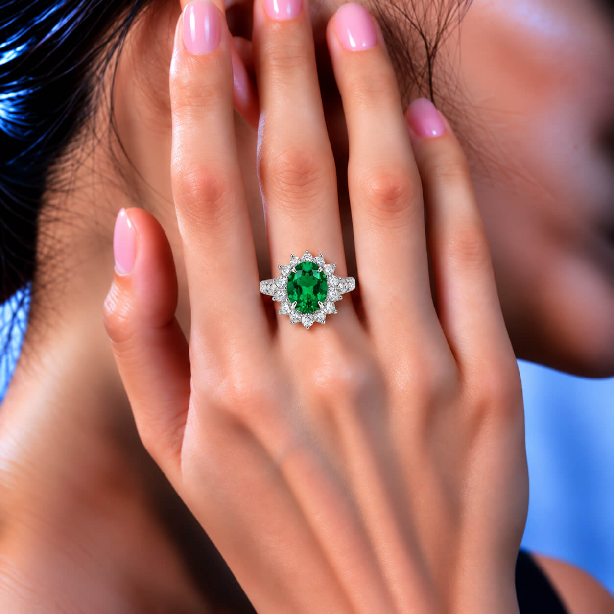Halo setting oval cut lab grown emerald engagement ring