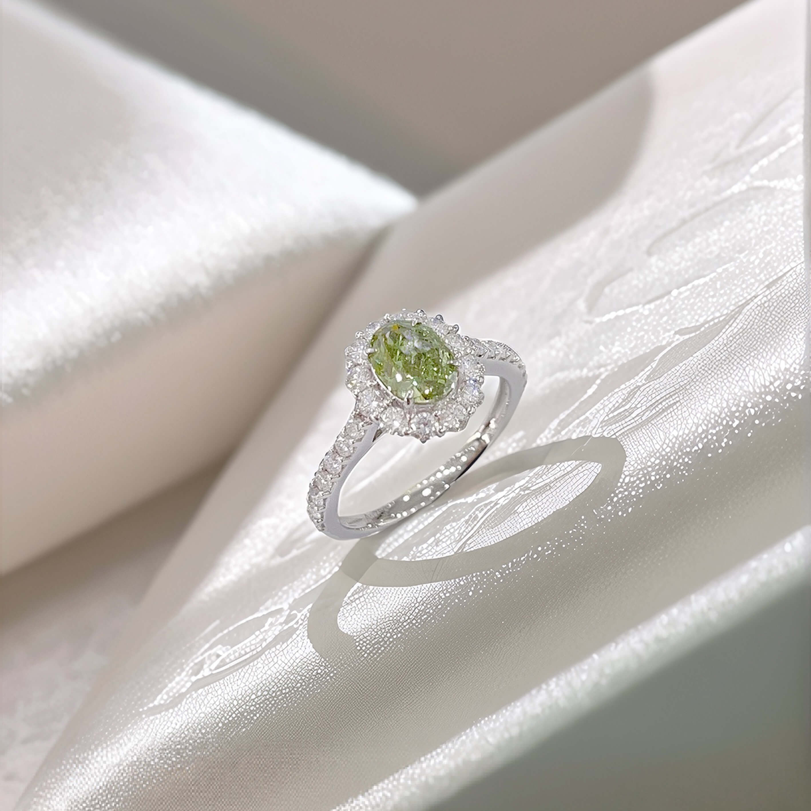 Halo setting oval cut lab grown green diamond engagement ring