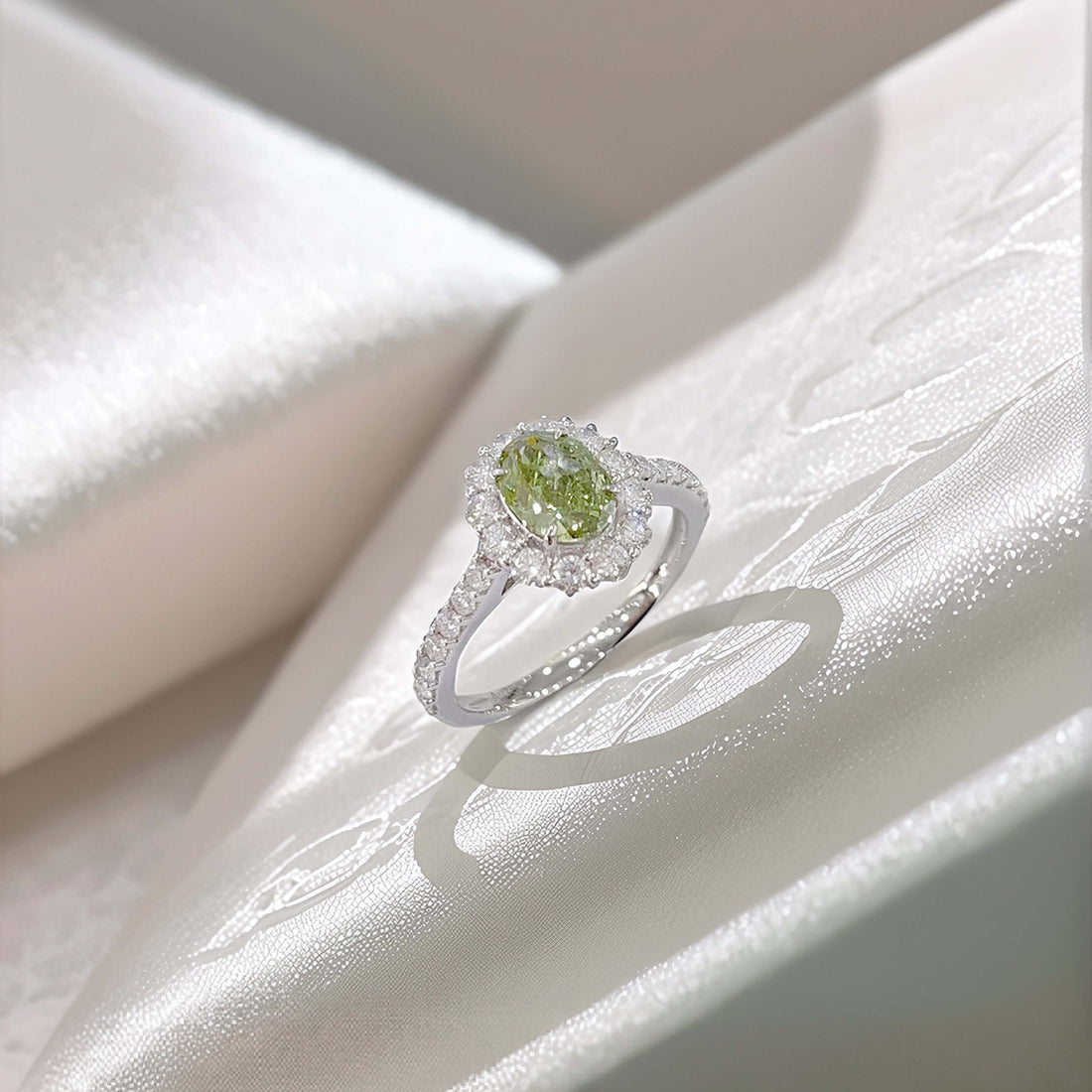 Halo setting oval cut lab grown green diamond engagement ring