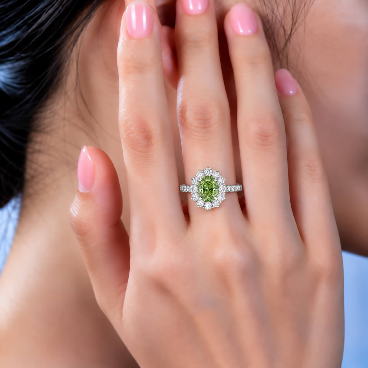 Halo setting oval cut lab grown green diamond engagement ring