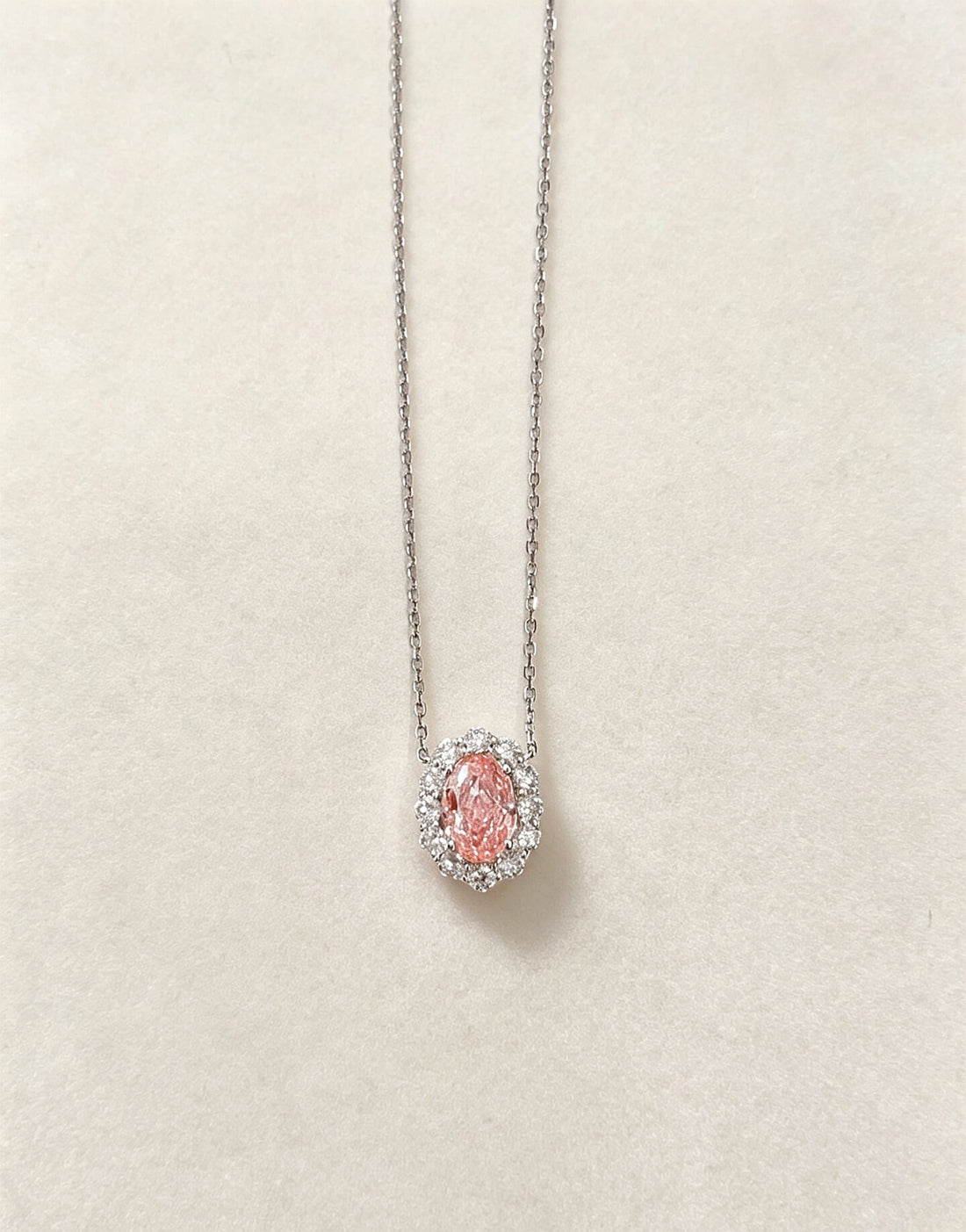 Halo setting oval cut lab grown pink diamond pendant necklace