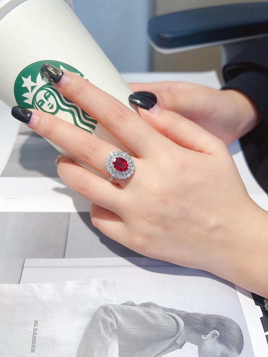 Halo setting oval cut lab grown ruby engagement ring