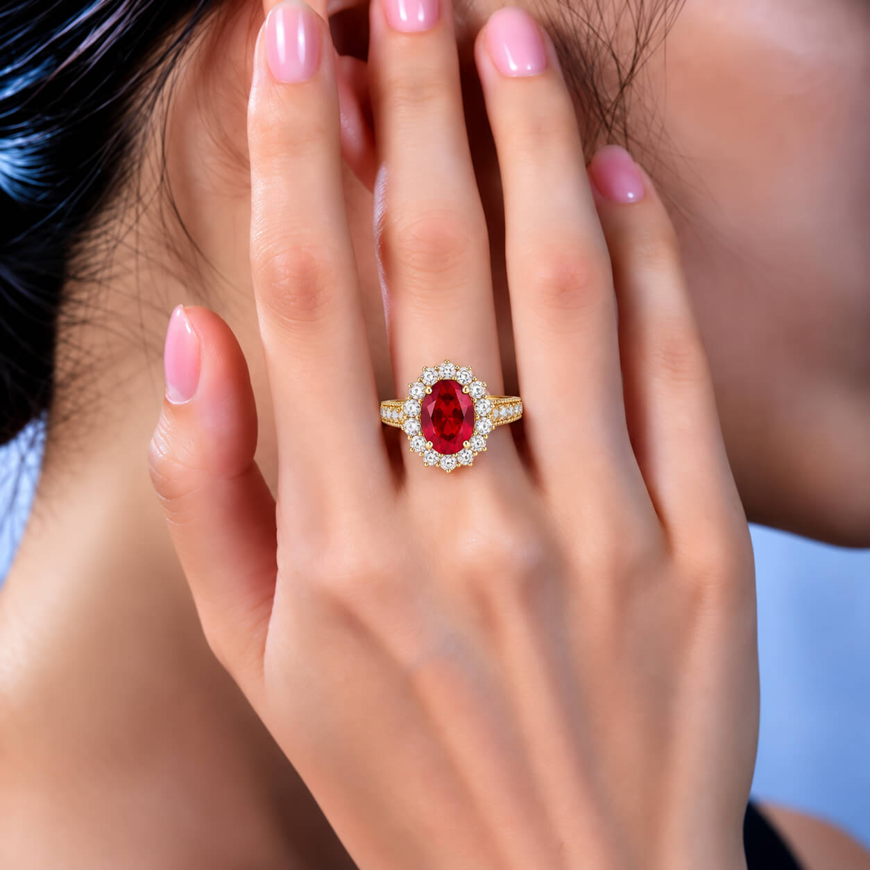 Halo setting oval cut lab grown ruby engagement ring
