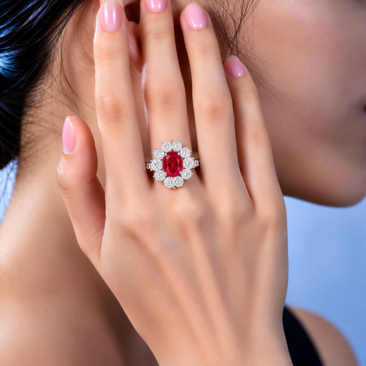 Halo setting oval cut lab grown ruby engagement ring