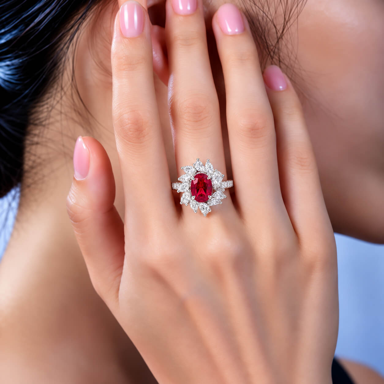 Halo setting oval cut lab grown ruby engagement ring