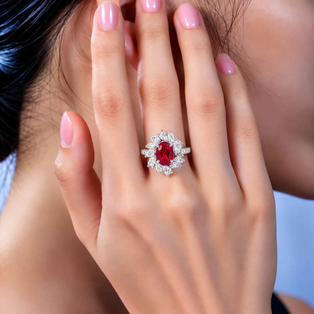 Halo setting oval cut lab grown ruby engagement ring