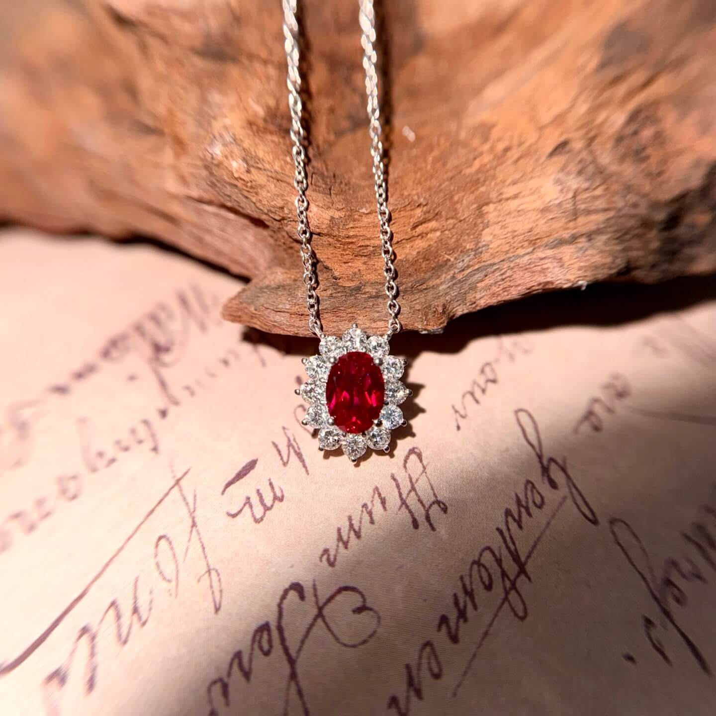 Halo setting oval cut lab grown ruby pendant necklace