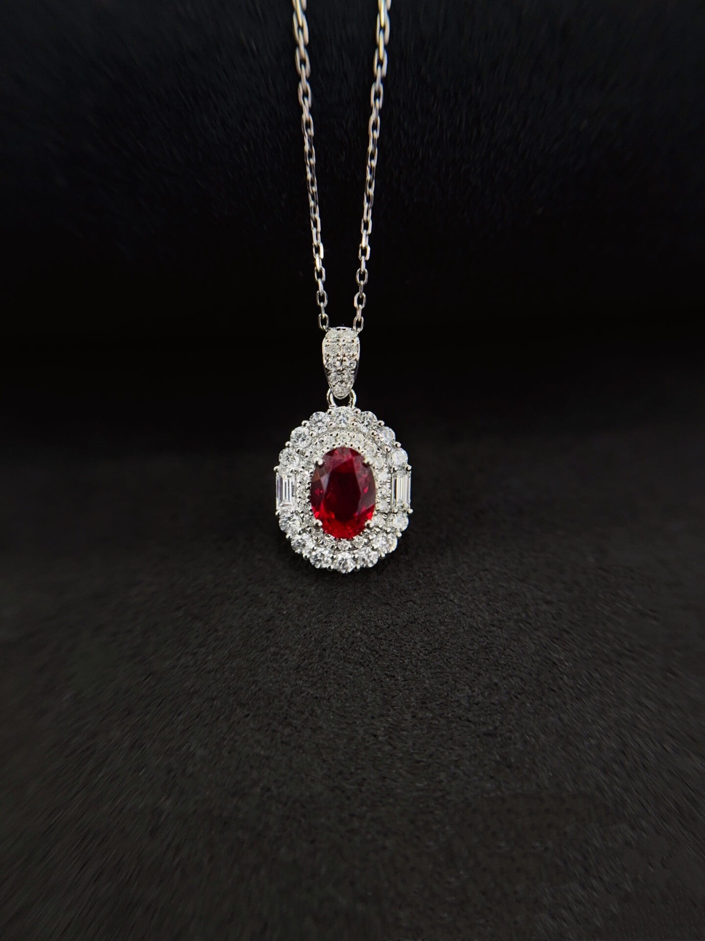 Halo setting oval cut lab grown ruby pendant necklace