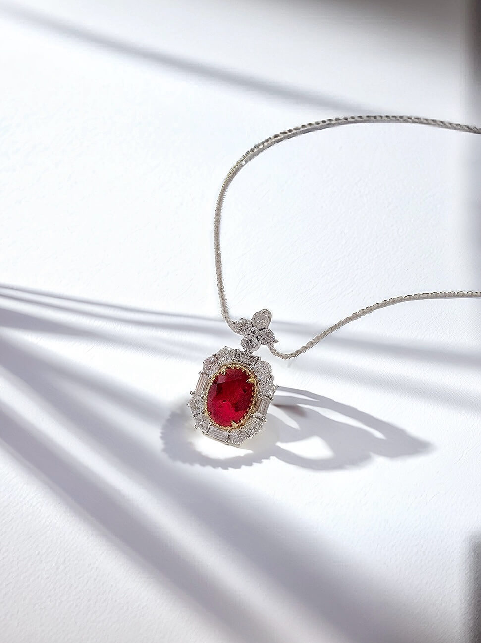 Halo setting oval cut lab grown ruby pendant necklace
