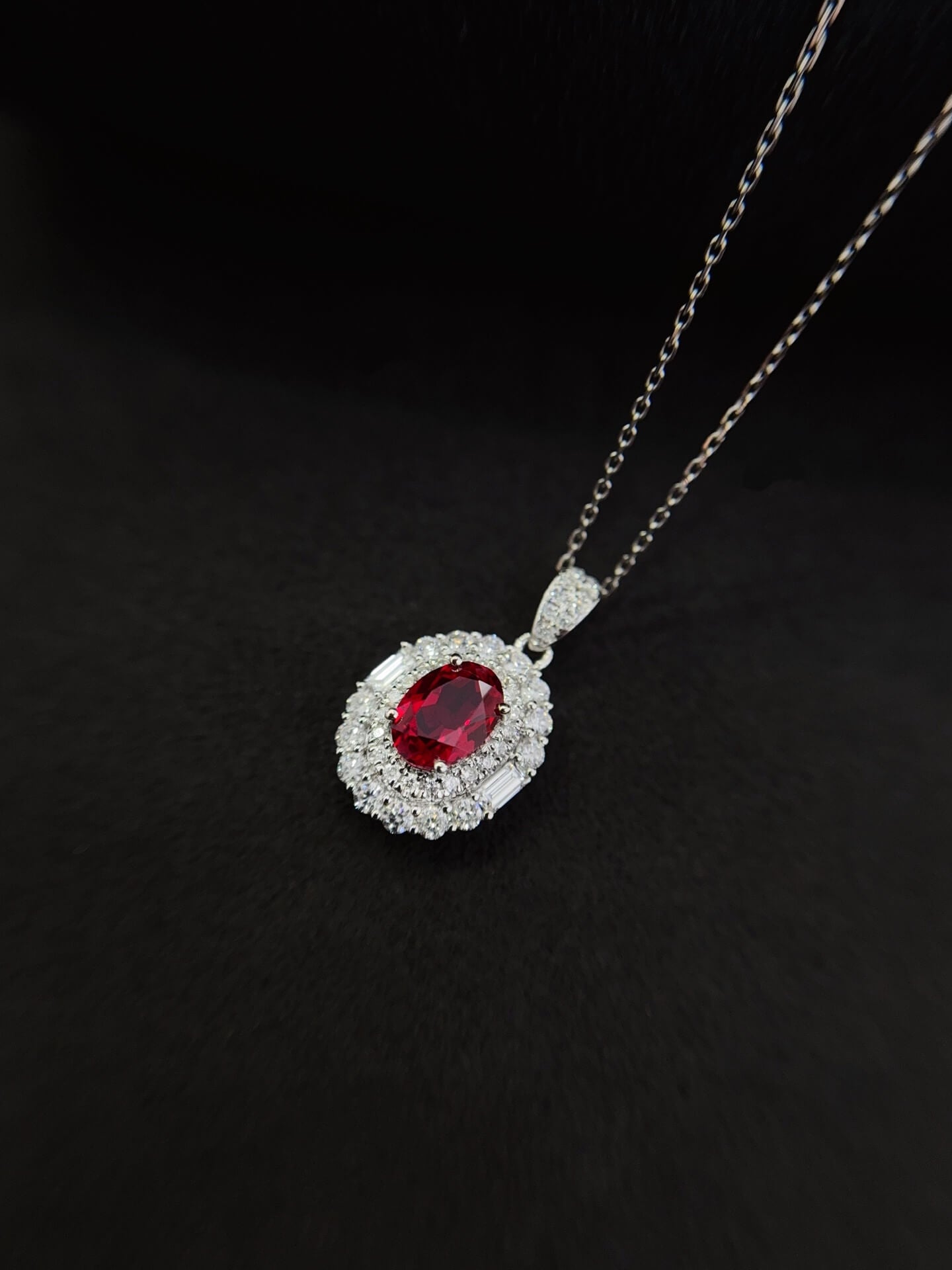 Halo setting oval cut lab grown ruby pendant necklace