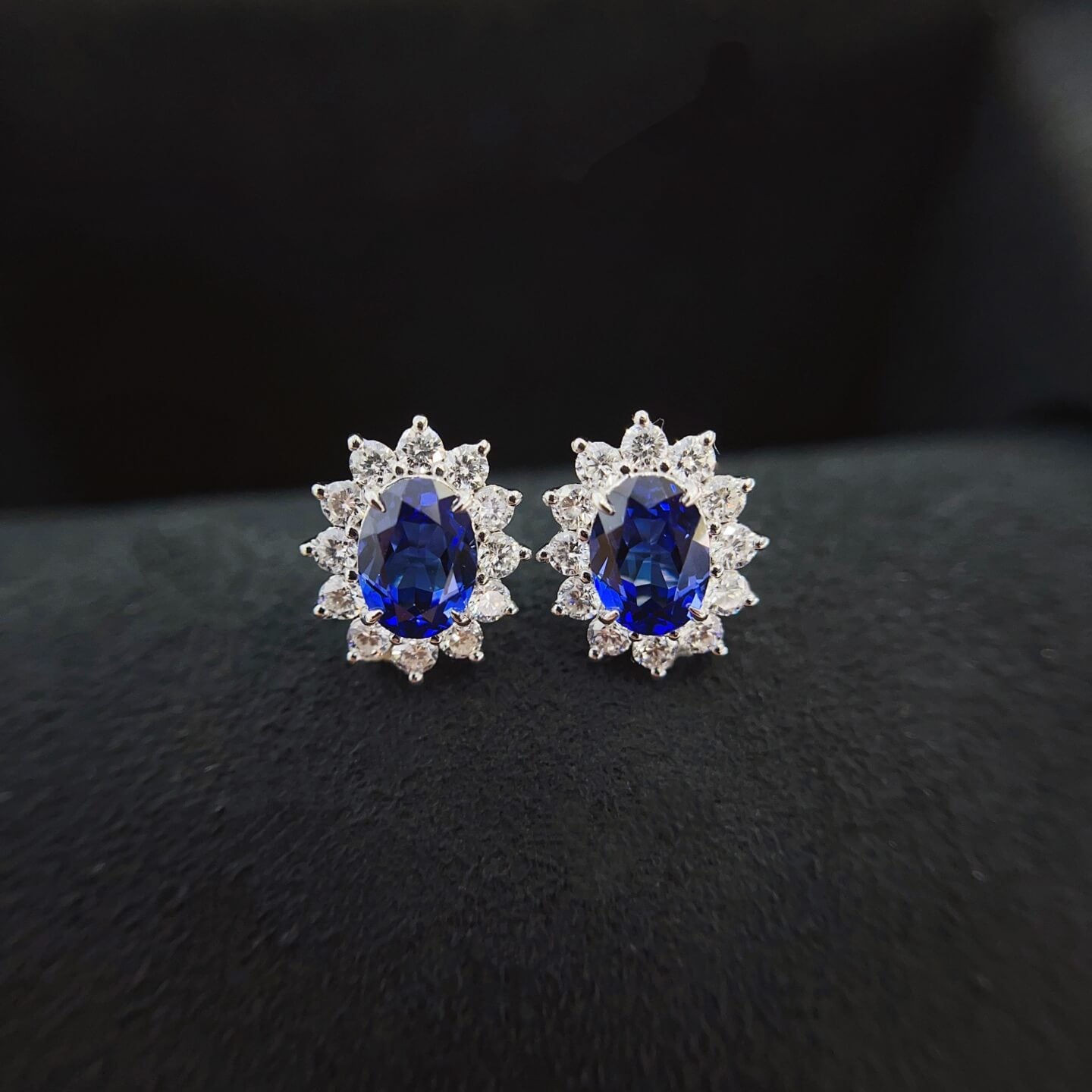Halo setting oval cut lab grown sapphire earrings stud