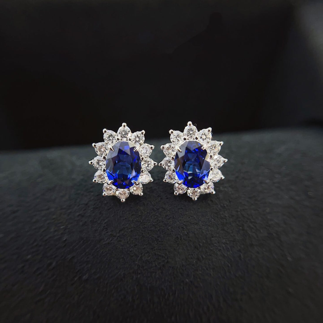 Halo setting oval cut lab grown sapphire earrings stud