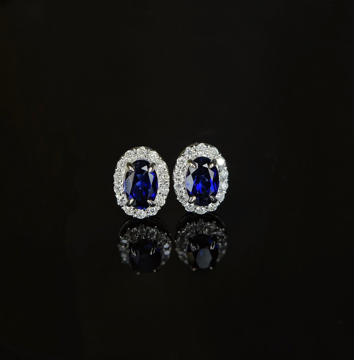 Halo setting oval cut lab grown sapphire earrings stud