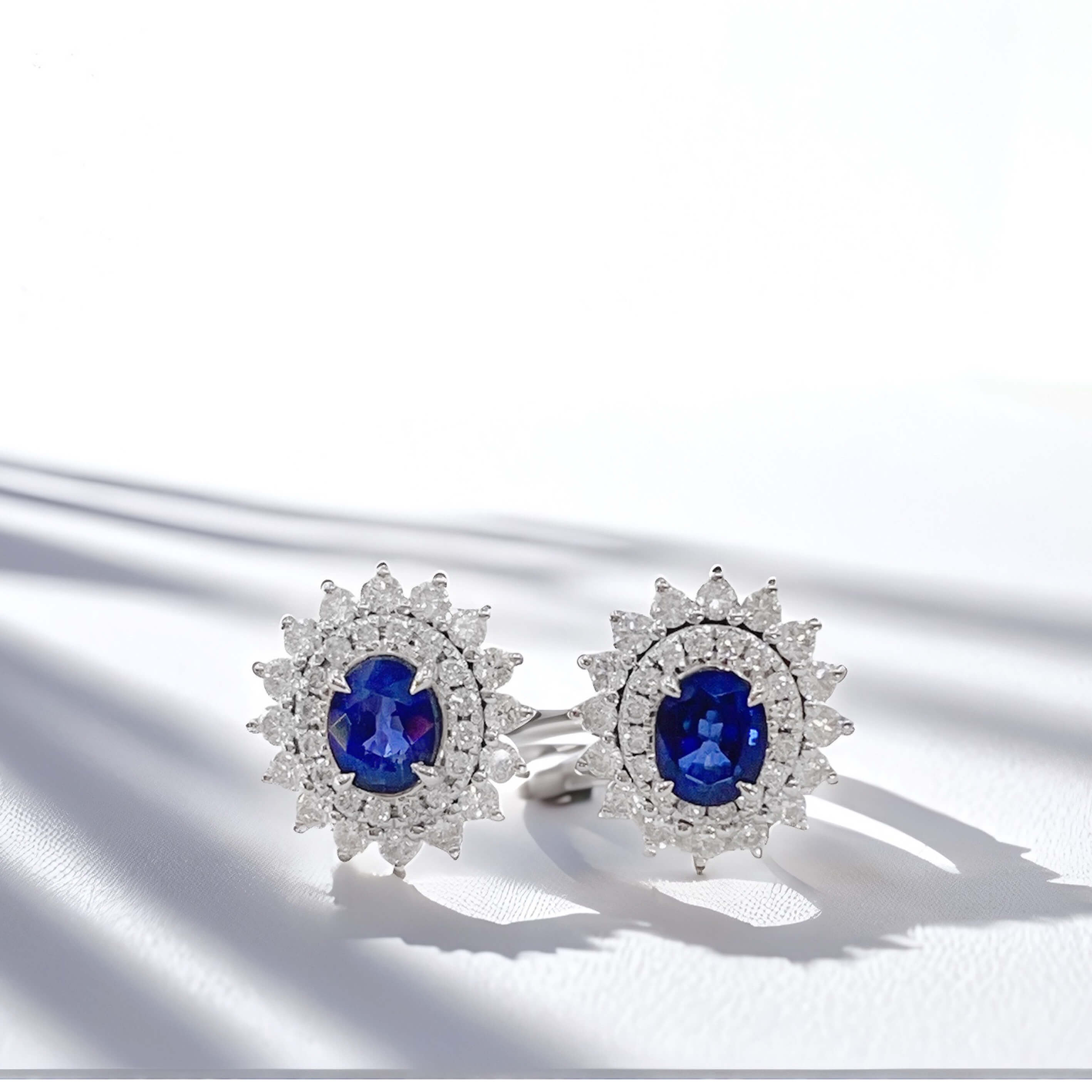 Halo setting oval cut lab grown sapphire earrings stud
